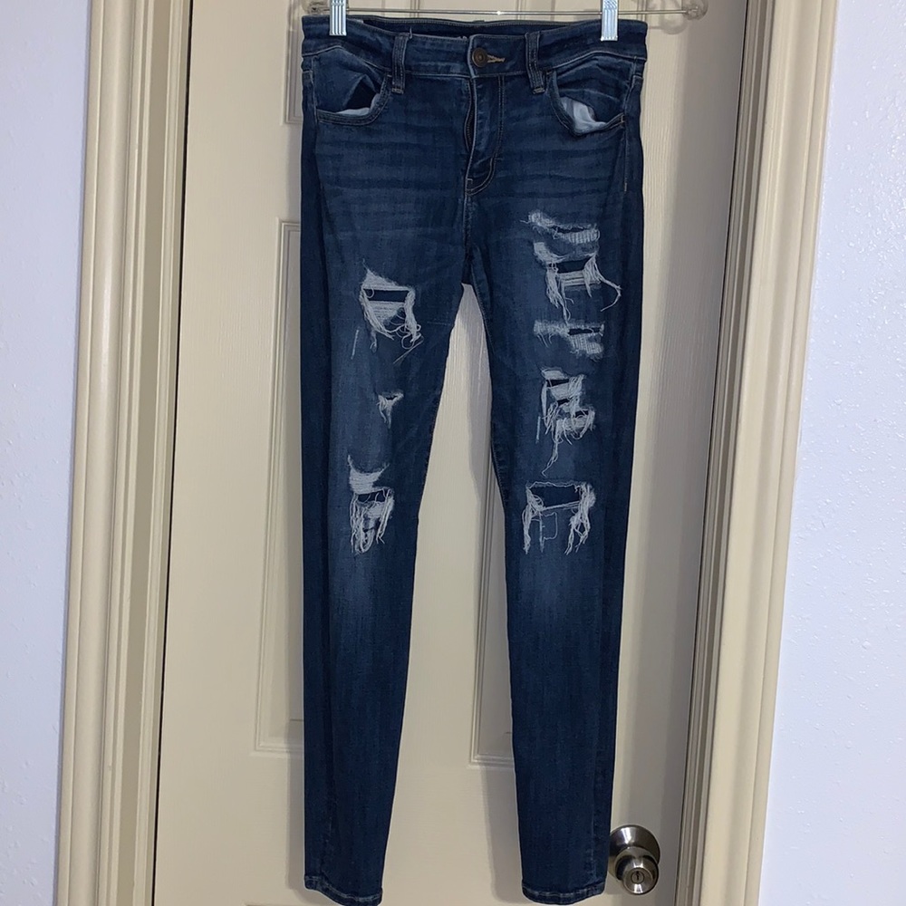 Distressed dark blue jeans,worn once,true to size.